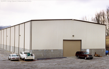 A warehouse building with wainscott section
